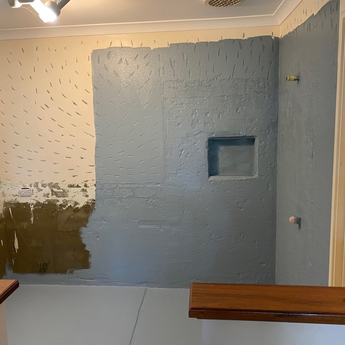 Bathroom stripped back during surface preparation and waterproofing before tiling in Perth