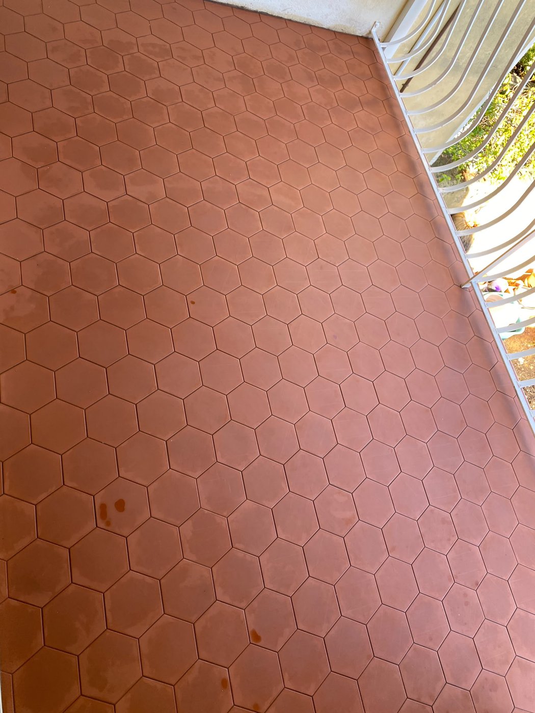 Terracotta hexagon outdoor floor tiling on a Perth balcony